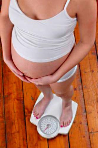 причини зміни ваги під час вагітності